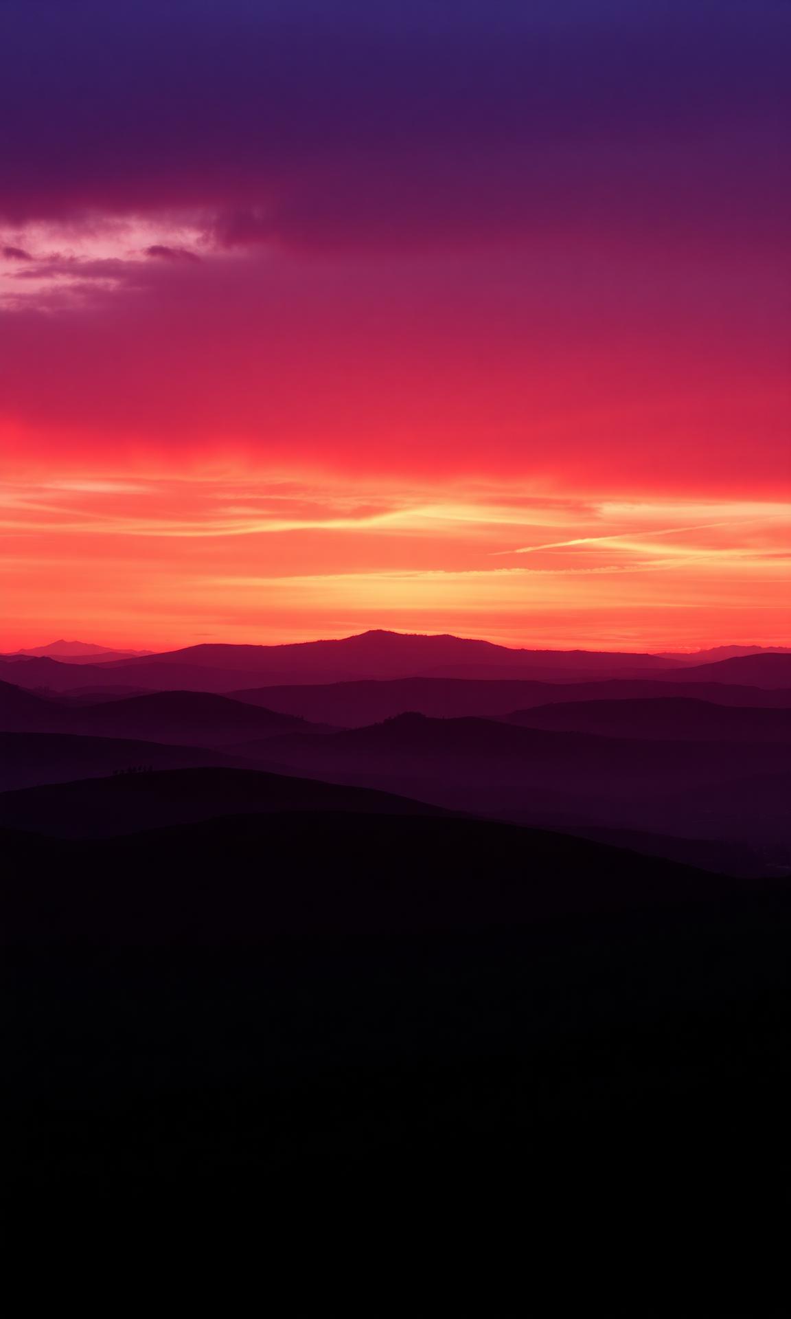 A warm sunset over the horizon